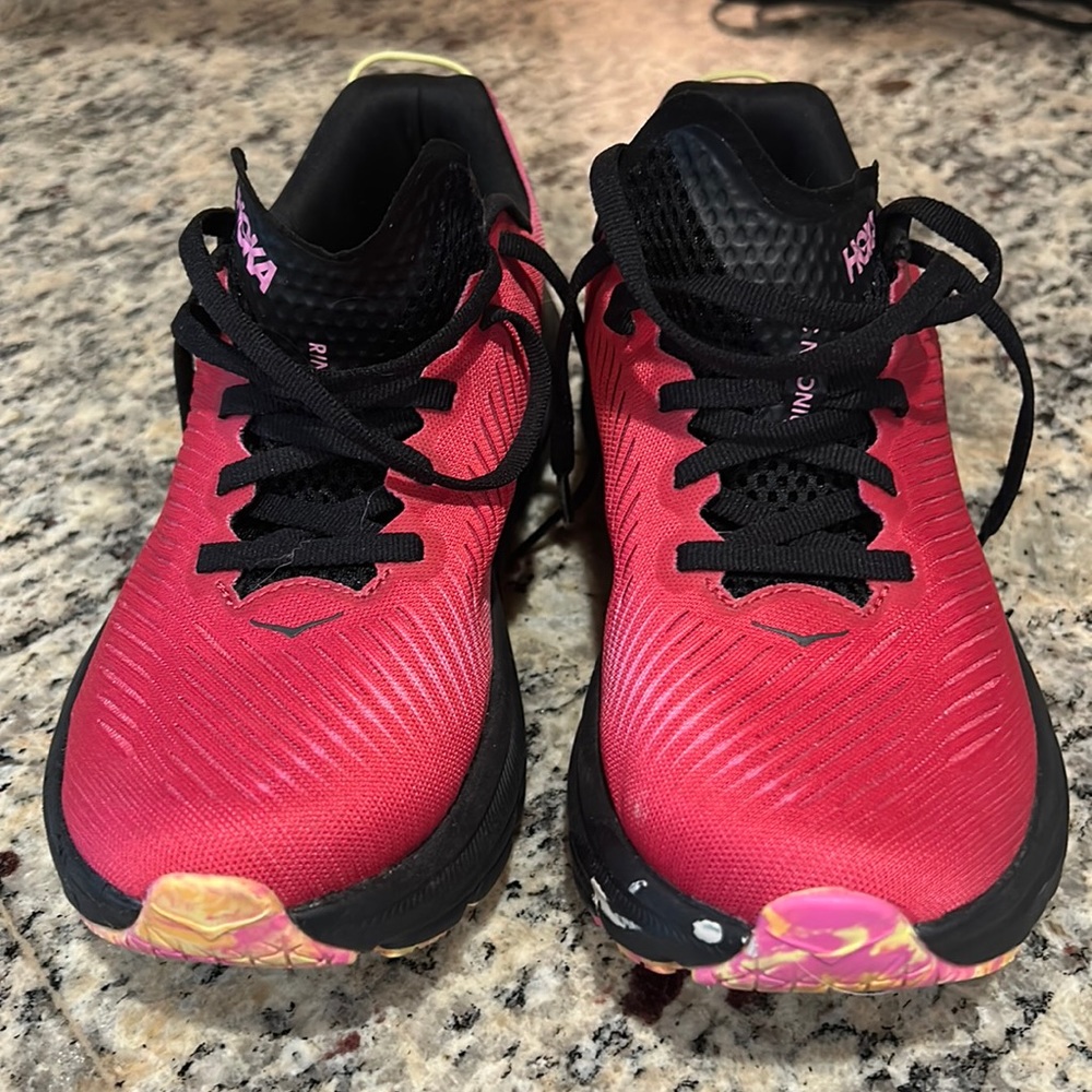 Rincon 3 Hoka. Purchased in august 2023. Tiny bit of paint near front.